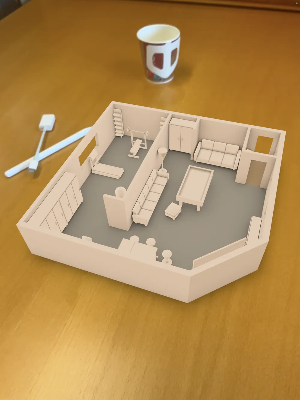 The finished room placed in a real space in augmented reality, seen on iPad